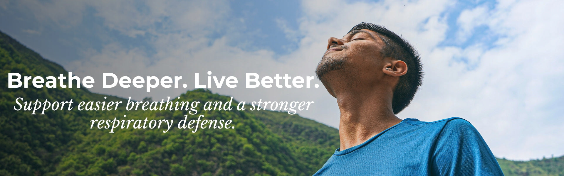 Man breathing deeply with mountains and blue sky in the background, accompanied by text about better breathing.