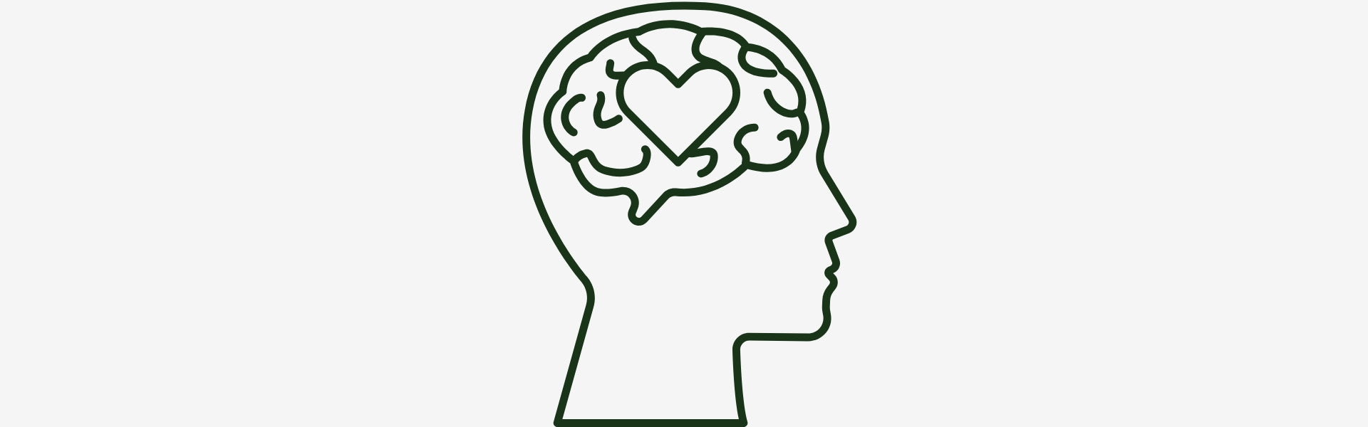 Profile of a human head with a heart in the brain area on a white background
